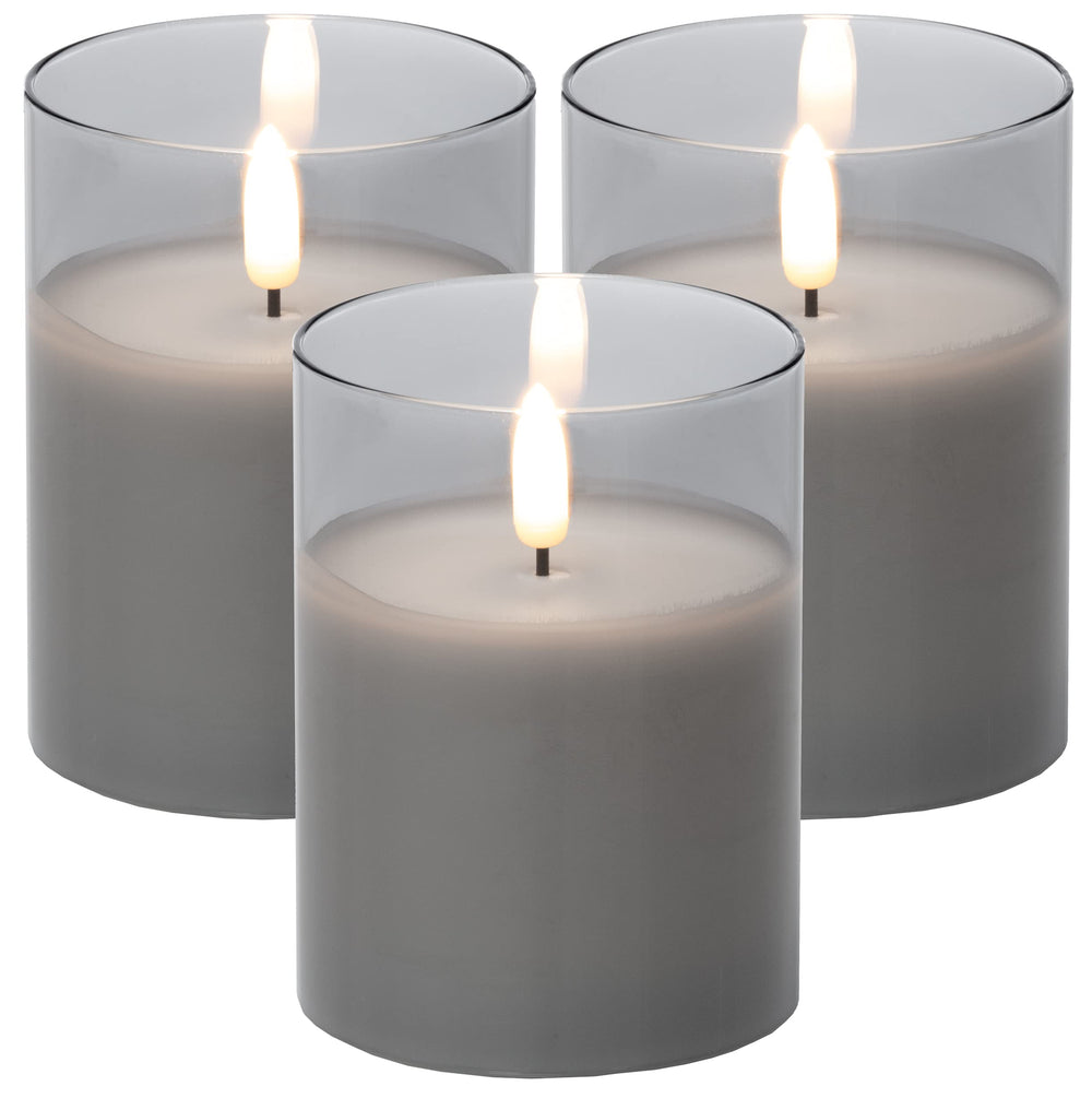 Brandsseller LED Kerze 7,5x10 cm Echtwachs im Glas Warmweiß Flackerfunktion Timerfunktion - Grau