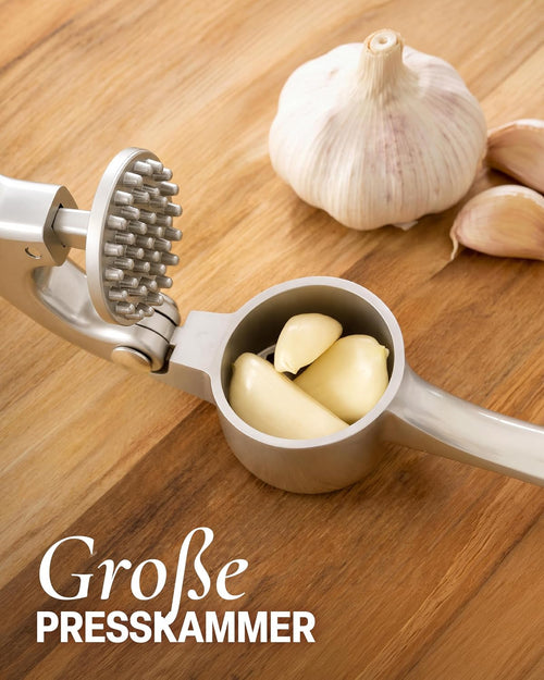 Zulay Kitchen Knoblauchpresse Edelstahl mit Silikon-Knoblauchschäler und Reinigungsbürste, Knoblauchpresse mit Komfortabler Griff, Ingwerpresse, Haushaltshelfer Knoblauch presse Garlic Crusher, Silber